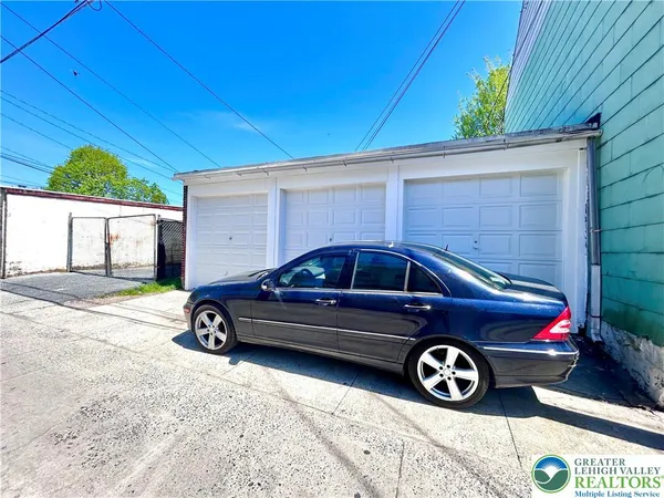 a car parked in front of a house