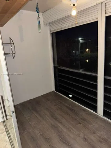 a bathroom with a sink toilet and mirror