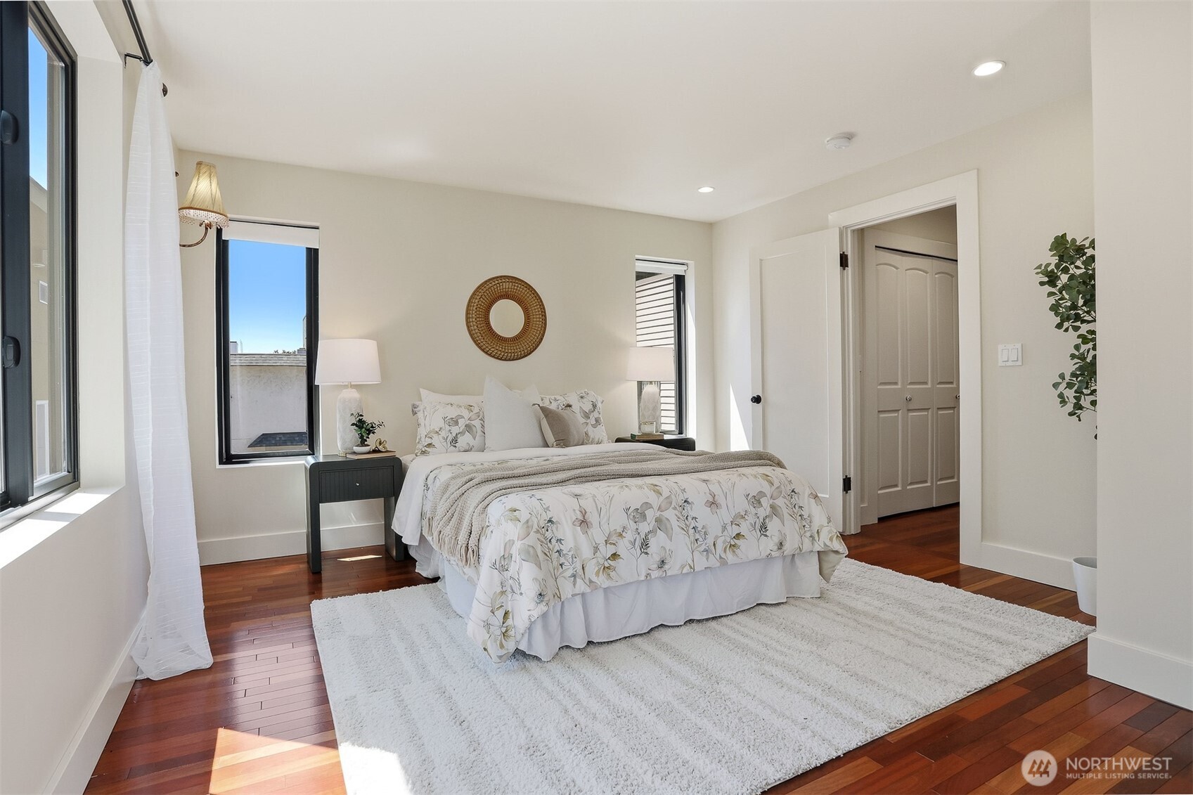 1749 Northwest 63rd Street Seattle, WA 98107 - Photo 16 of 40 a bedroom with a bed and a window