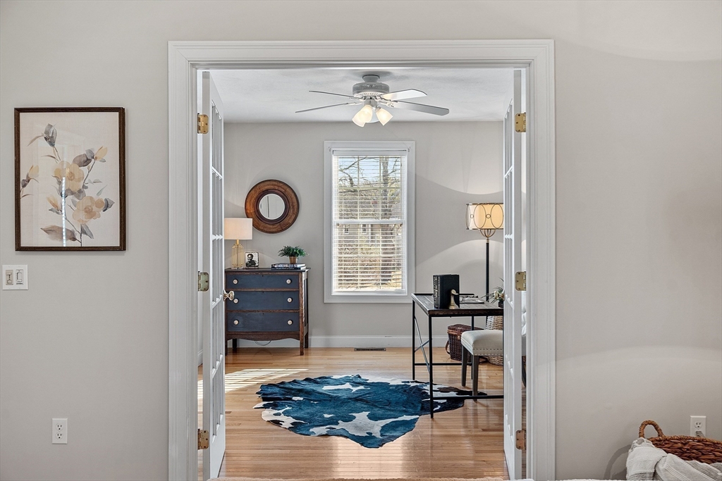 88 Ferry Road Salisbury, MA 01952 - Photo 24 of 42 a living room with furniture and a chandelier