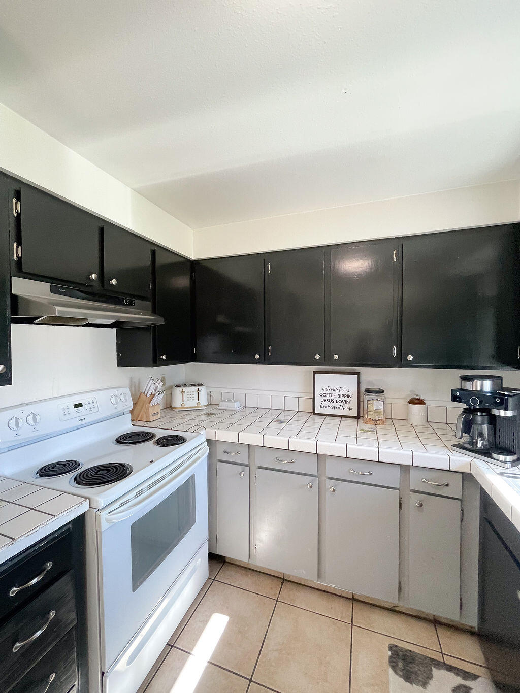 3037 Clearbrook Place Malin, OR 97632 - Photo 9 of 30 a kitchen with a sink and white cabinets