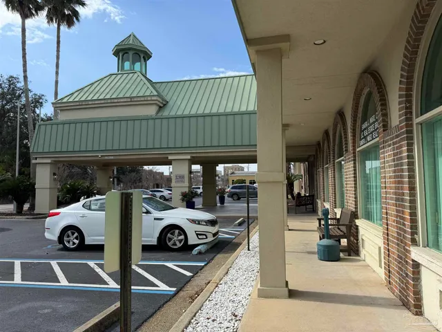 a view of a street with cars