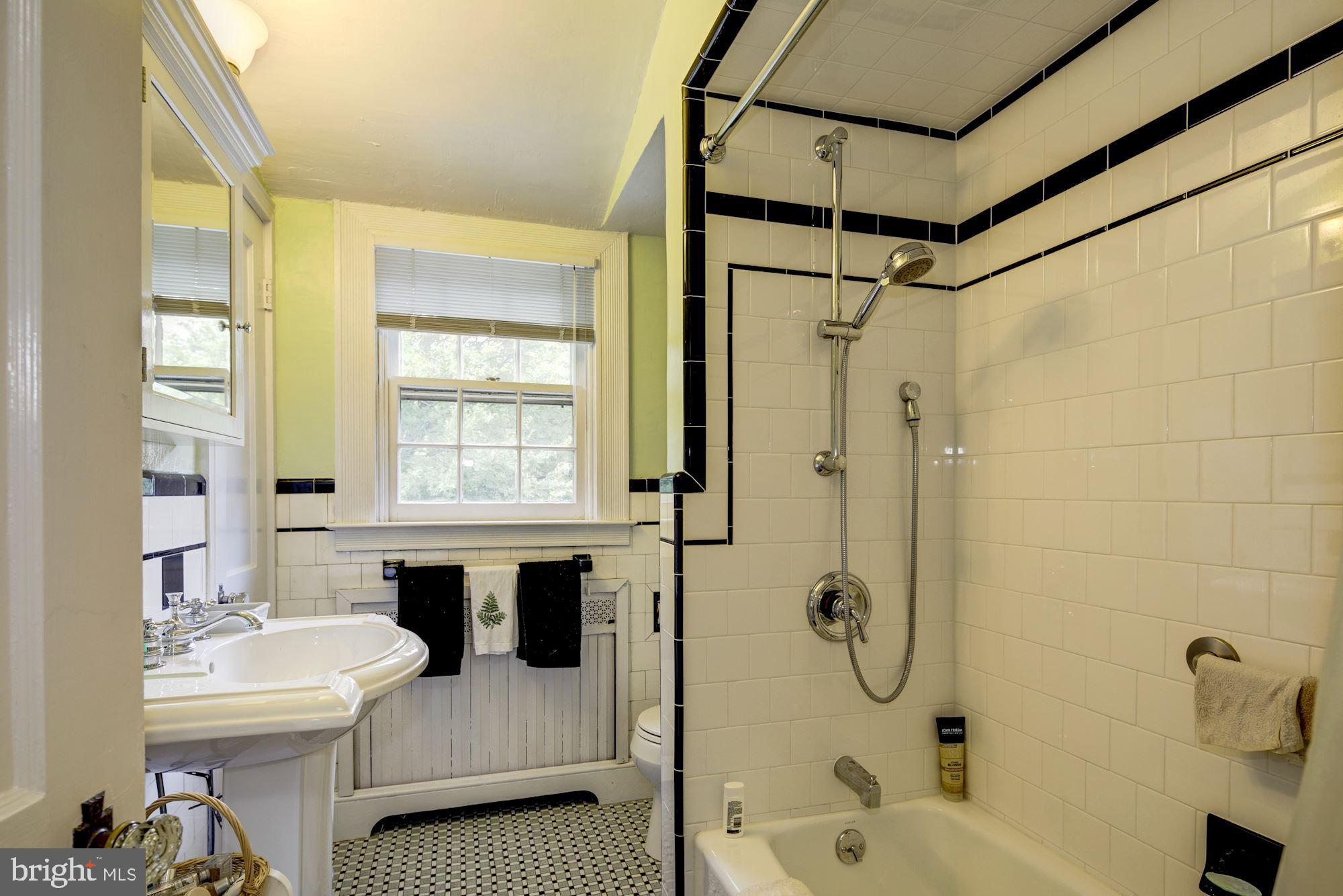 703 Kingston Road Baltimore, MD 21212 - Photo 34 of 45 Hall bath is renovated.