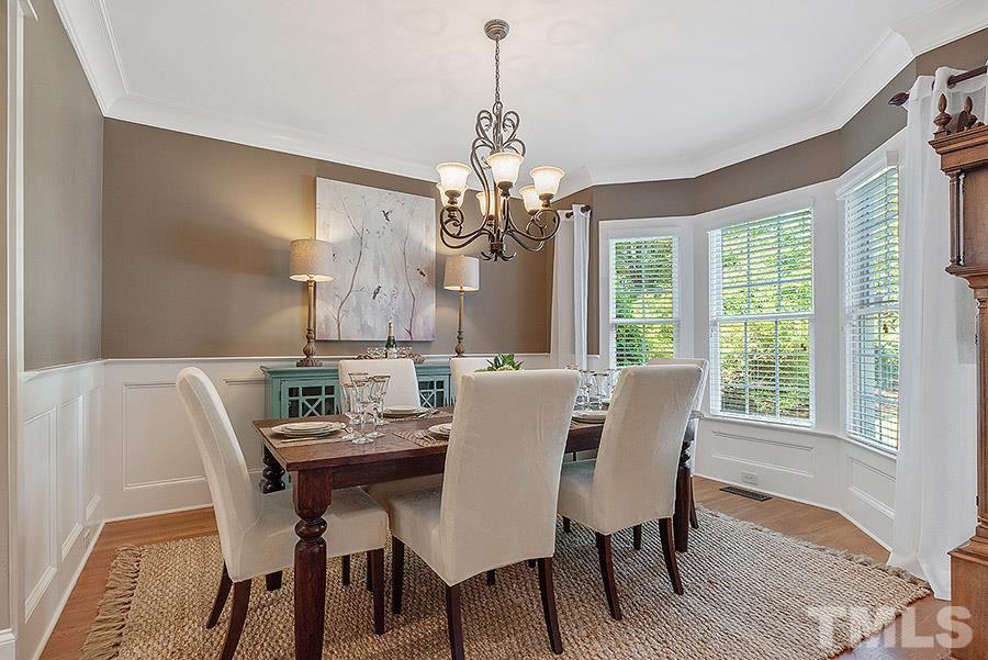 117 Bancroft Brook Drive Cary, NC 27519 - Photo 2 of 29 a view of a dining room with furniture window and outside view