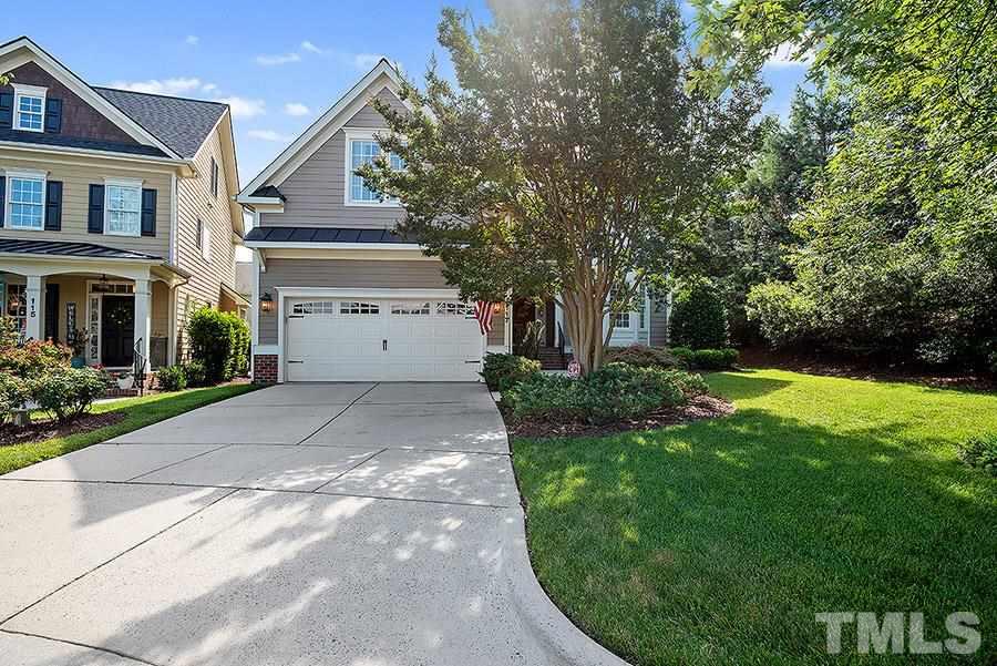 117 Bancroft Brook Drive Cary, NC 27519 - Photo 28 of 29 a view of house and garden with large trees