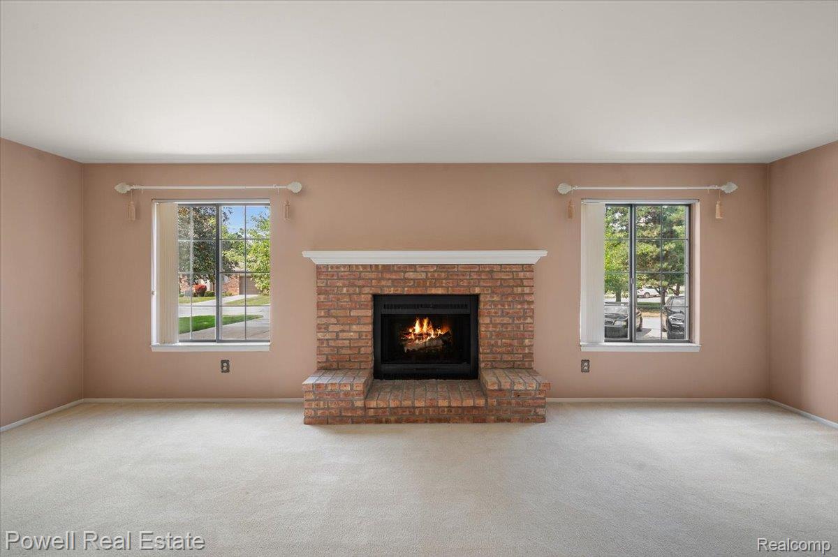 1938 Allenway Court Rochester, MI 48309 - Photo 14 of 39 Living Room with wood burning fireplace. (2 of 2)