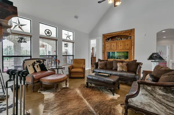 a living room with furniture or couch and a window
