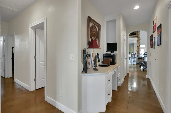 a kitchen with stainless steel appliances a sink and a refrigerator
