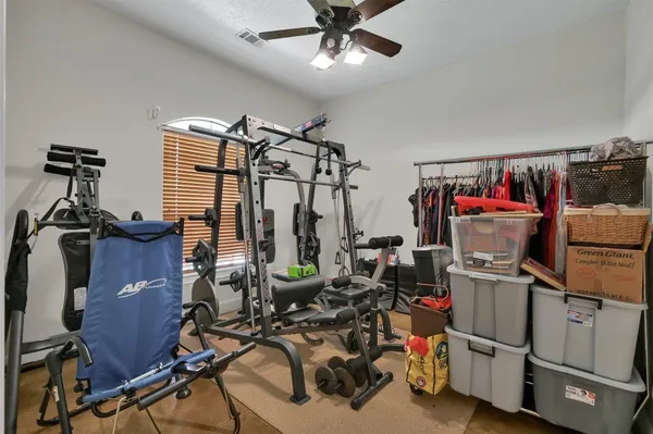 a view of a room with gym equipment
