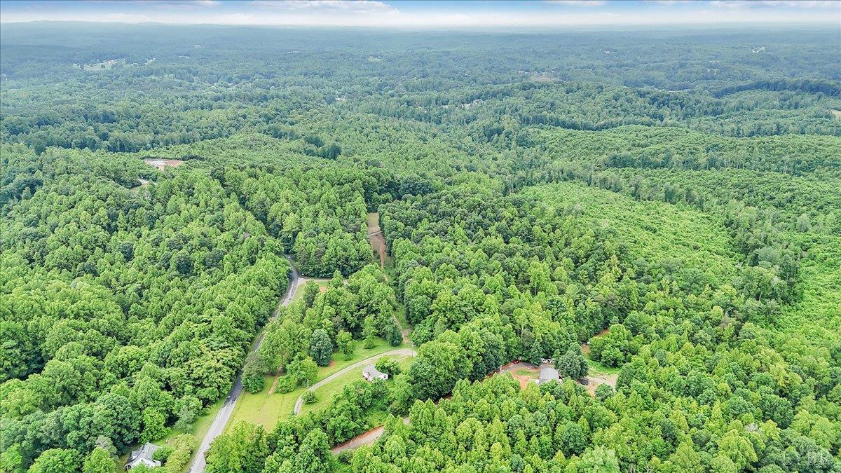 38 Frank Redd Road Fieldale, VA 24089 - Photo 5 of 12 a view of a field of grass and trees
