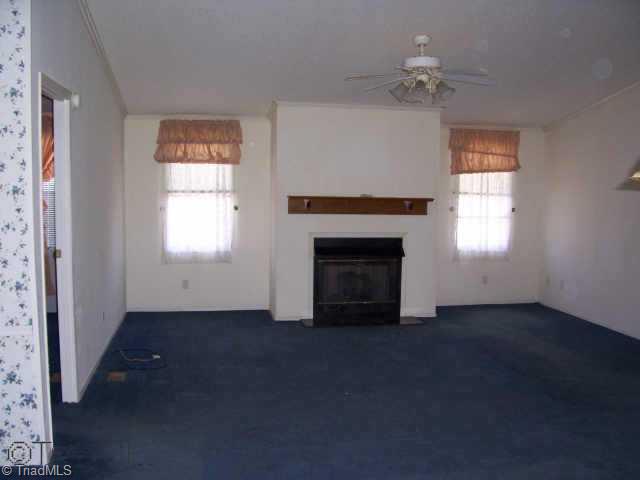 4104 Dodgetown Road Walnut Cove, NC 27052 - Photo 5 of 8 Other. Huge living room with fireplace.