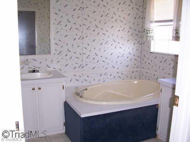 4104 Dodgetown Road Walnut Cove, NC 27052 - Photo 6 of 8 Other. Nice master bath with garden tub and seperate shower.