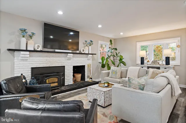 a bathroom with a sink toilet a shower and a mirror