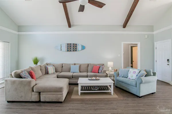 a living room with furniture and a couch