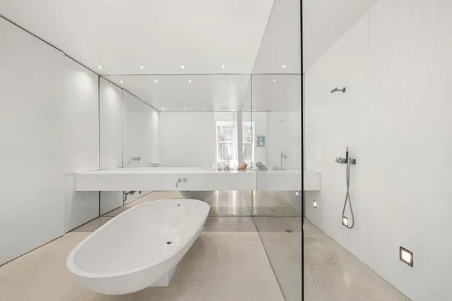 a bedroom with a bed and a cabinets