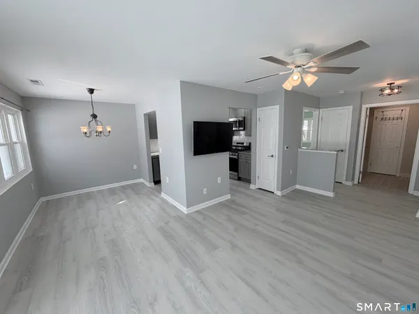 a view of a livingroom with a flat screen tv