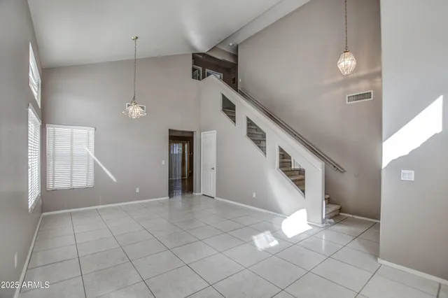 a view of entryway and hall with a window