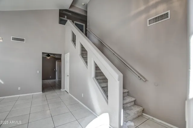 a view of entryway and kitchen