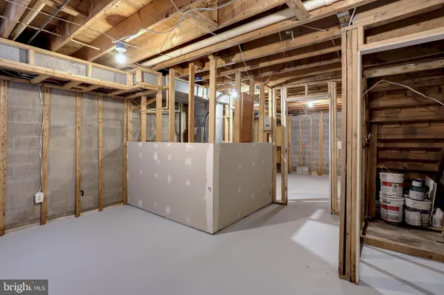 a view of a room with wooden walls