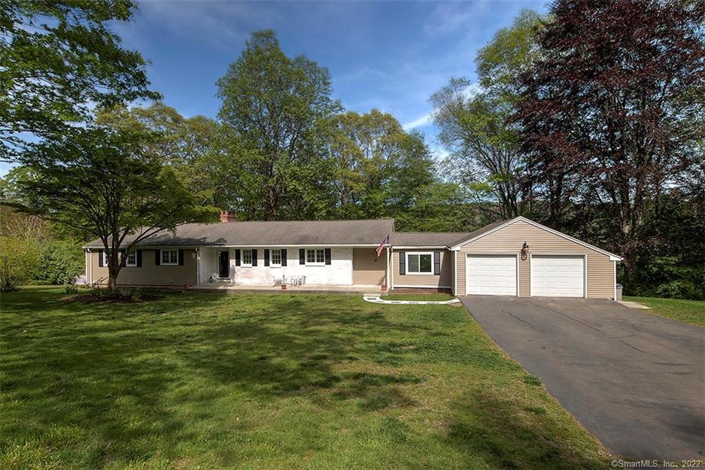 15 Ariel Road Woodbridge, CT 06525 - Photo 1 of 1 front view of a house with a yard