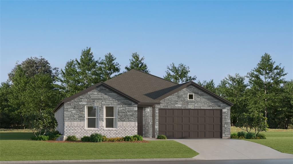 View of front facade with stone siding, an attached garage, a front yard, and concrete driveway