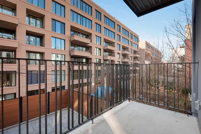 a bathroom with a toilet a sink and shower