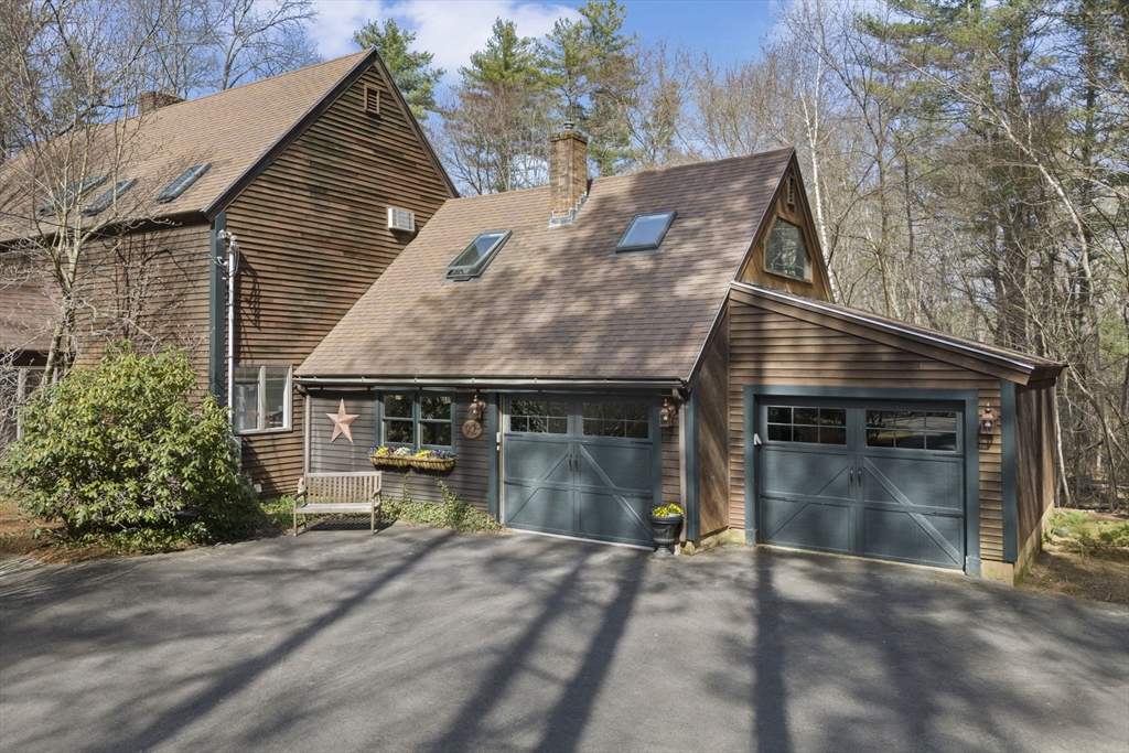 92 Middleton Road Boxford, MA 01921 - Photo 2 of 42 a view of a house with a yard and garage