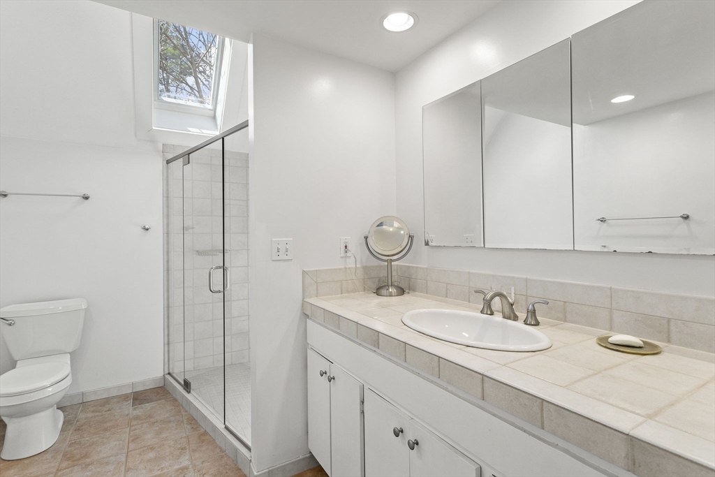 92 Middleton Road Boxford, MA 01921 - Photo 26 of 42 a bathroom with a sink toilet and shower