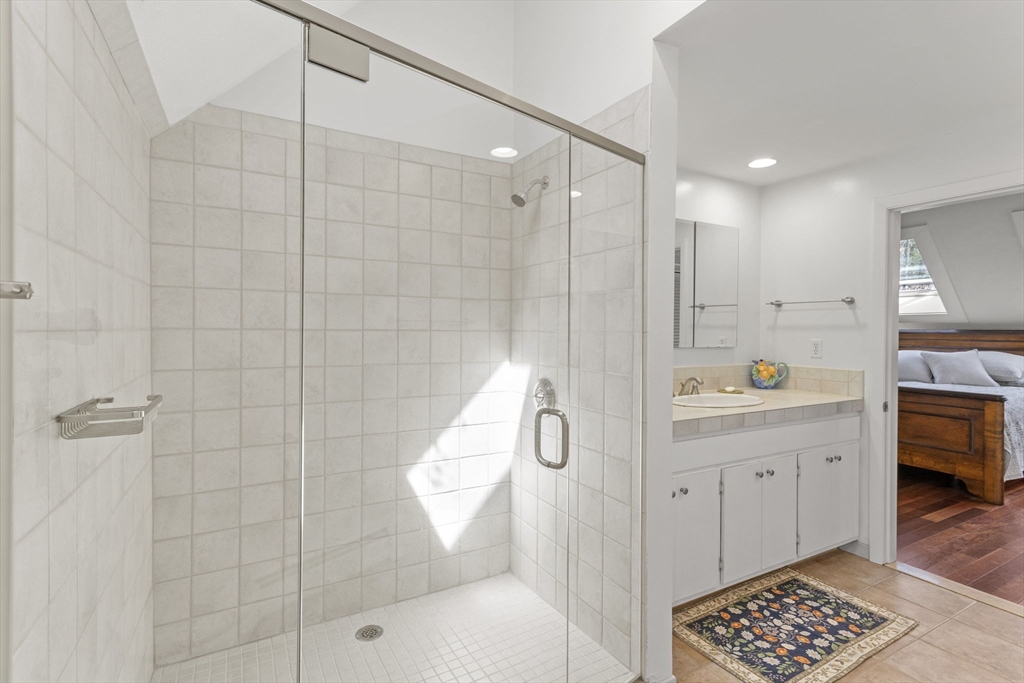 92 Middleton Road Boxford, MA 01921 - Photo 27 of 42 a bathroom with a sink a toilet and shower