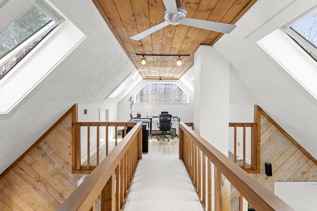 92 Middleton Road Boxford, MA 01921 - Photo 28 of 42 a view of staircase with wooden floor and fan