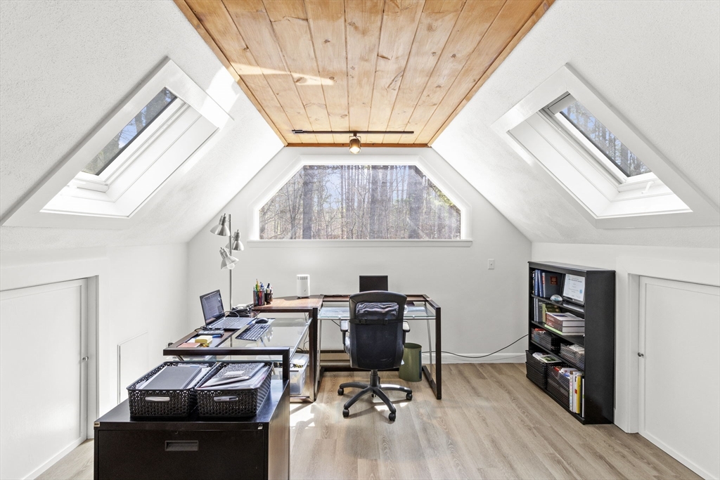 92 Middleton Road Boxford, MA 01921 - Photo 29 of 42 a view of a workspace with furniture and a window