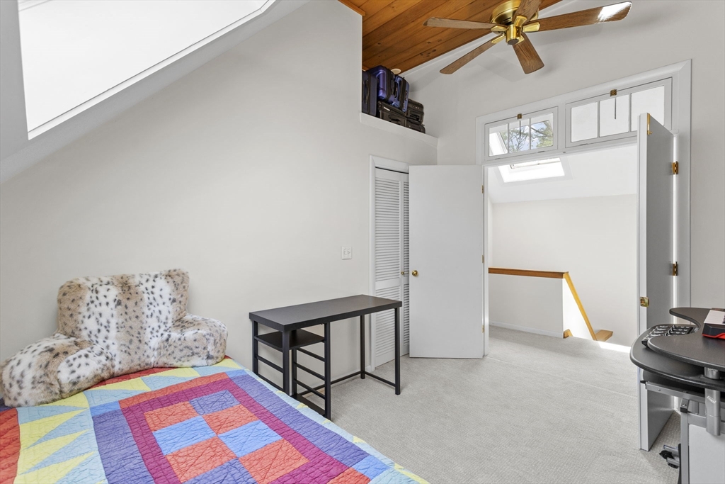 92 Middleton Road Boxford, MA 01921 - Photo 32 of 42 a bedroom with a bed and a workspace