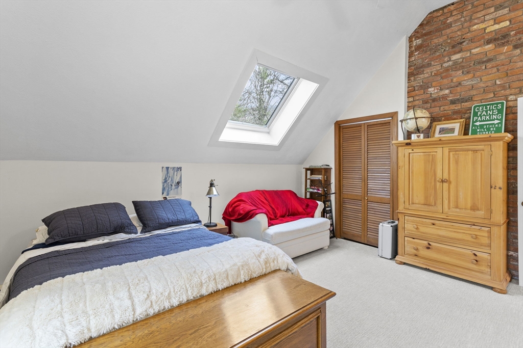 92 Middleton Road Boxford, MA 01921 - Photo 34 of 42 a bedroom with a bed and dresser