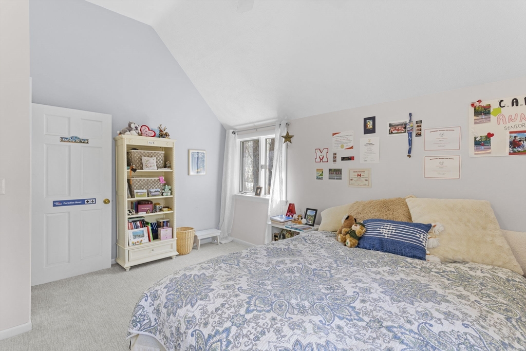 92 Middleton Road Boxford, MA 01921 - Photo 36 of 42 a bedroom with a bed and cabinets