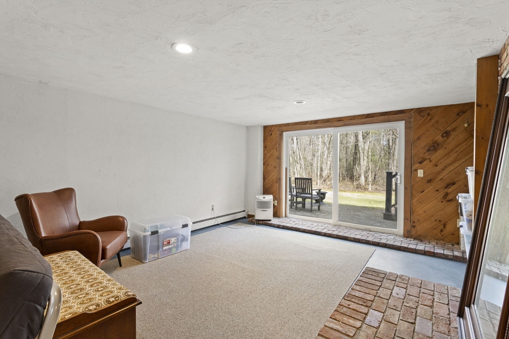 92 Middleton Road Boxford, MA 01921 - Photo 40 of 42 a view of a livingroom with furniture and a couch