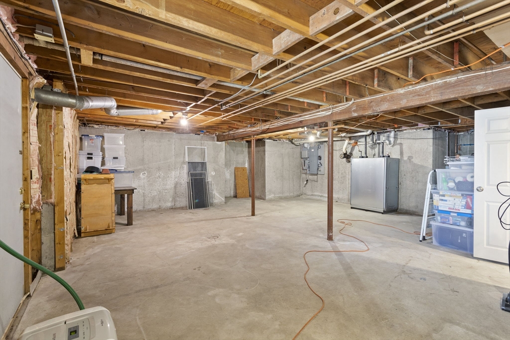 92 Middleton Road Boxford, MA 01921 - Photo 42 of 42 a view of an empty room with wooden roof