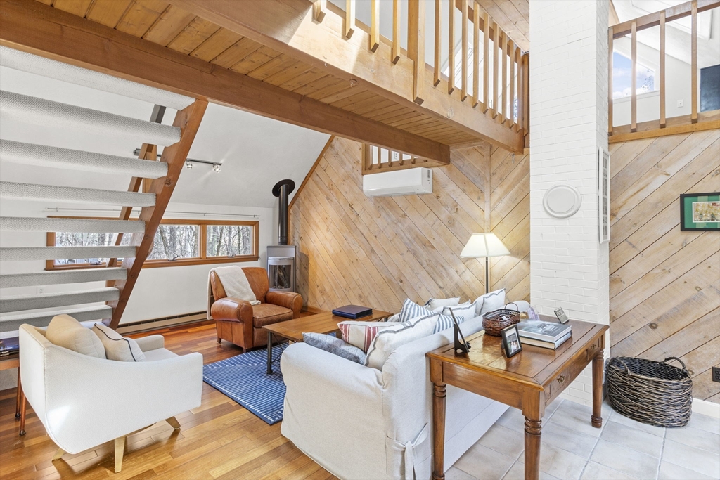 92 Middleton Road Boxford, MA 01921 - Photo 8 of 42 a living room with furniture a rug and a window