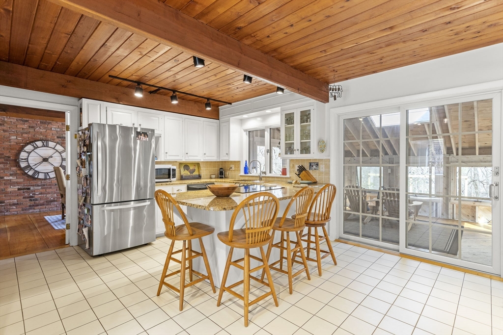 92 Middleton Road Boxford, MA 01921 - Photo 10 of 42 a dining space with furniture and large window