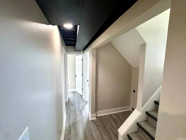 a view of entryway with wooden floor