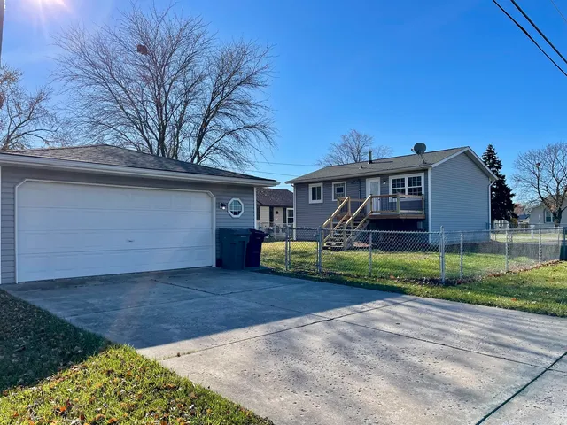 a view of a lake with a city