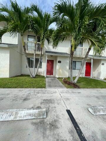 3104 Poolside Drive Greenacres, FL 33463 - Photo 1 of 10 front