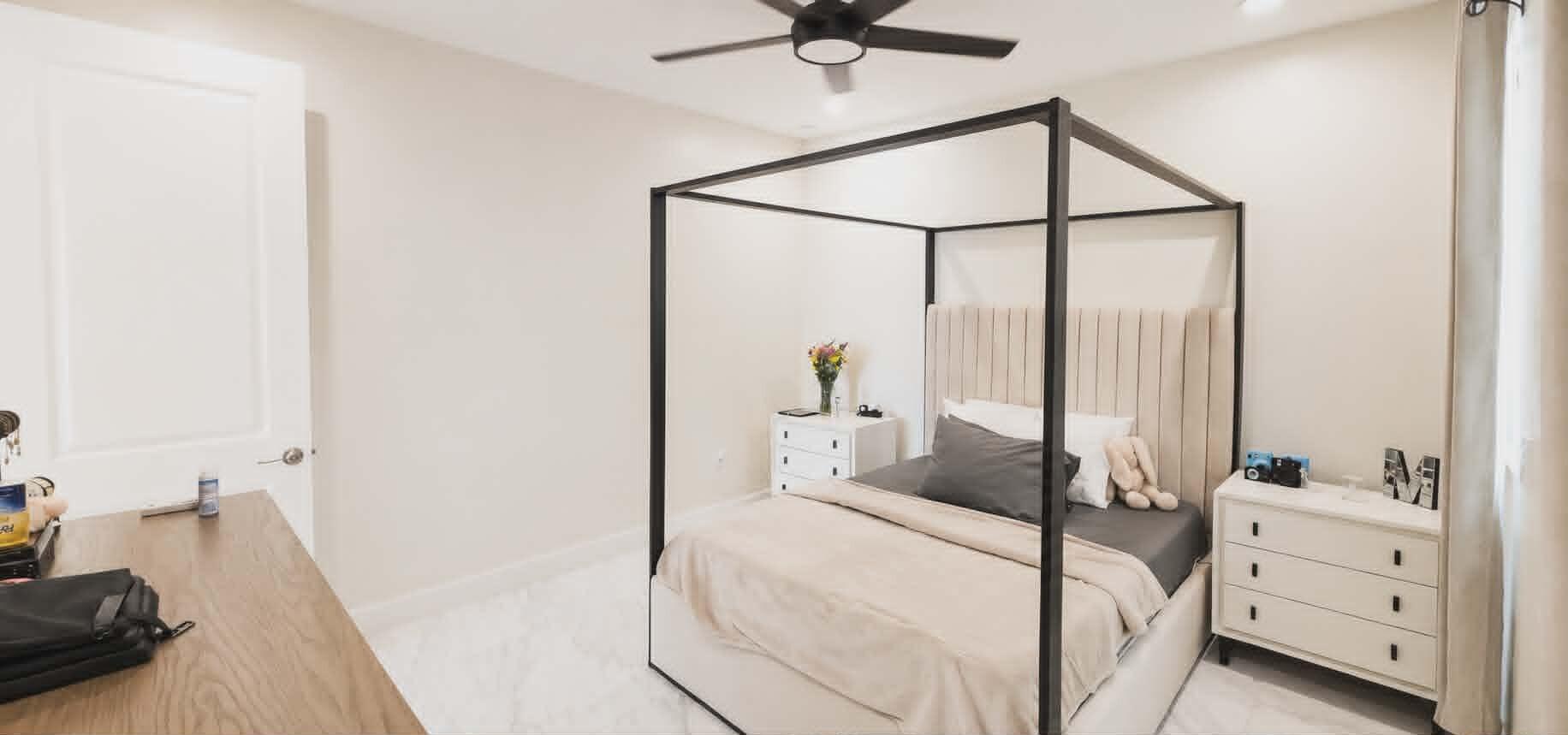 19179 Rolling Acrs Road Loxahatchee, FL 33470 - Photo 22 of 38 a en suite spacious bedroom with a bed and a dresser