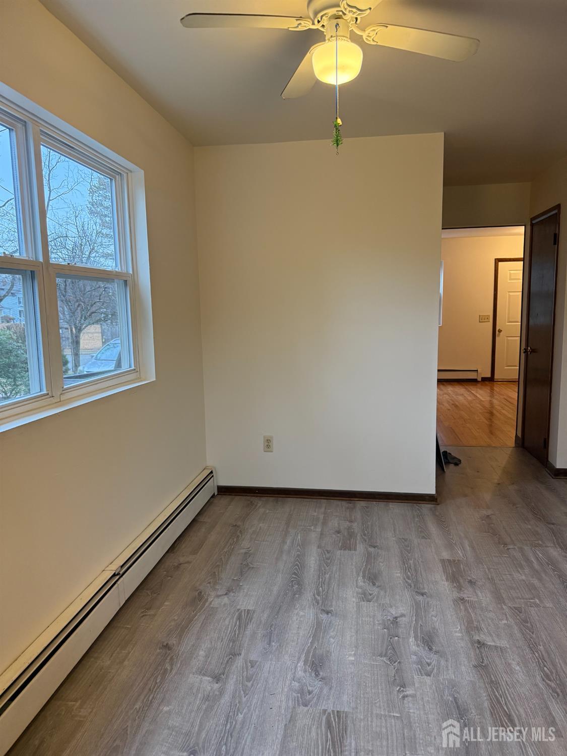 710-712 Drake Avenue, Unit 710 Middlesex, NJ 08846 - Photo 13 of 25 a view of an empty room with a window