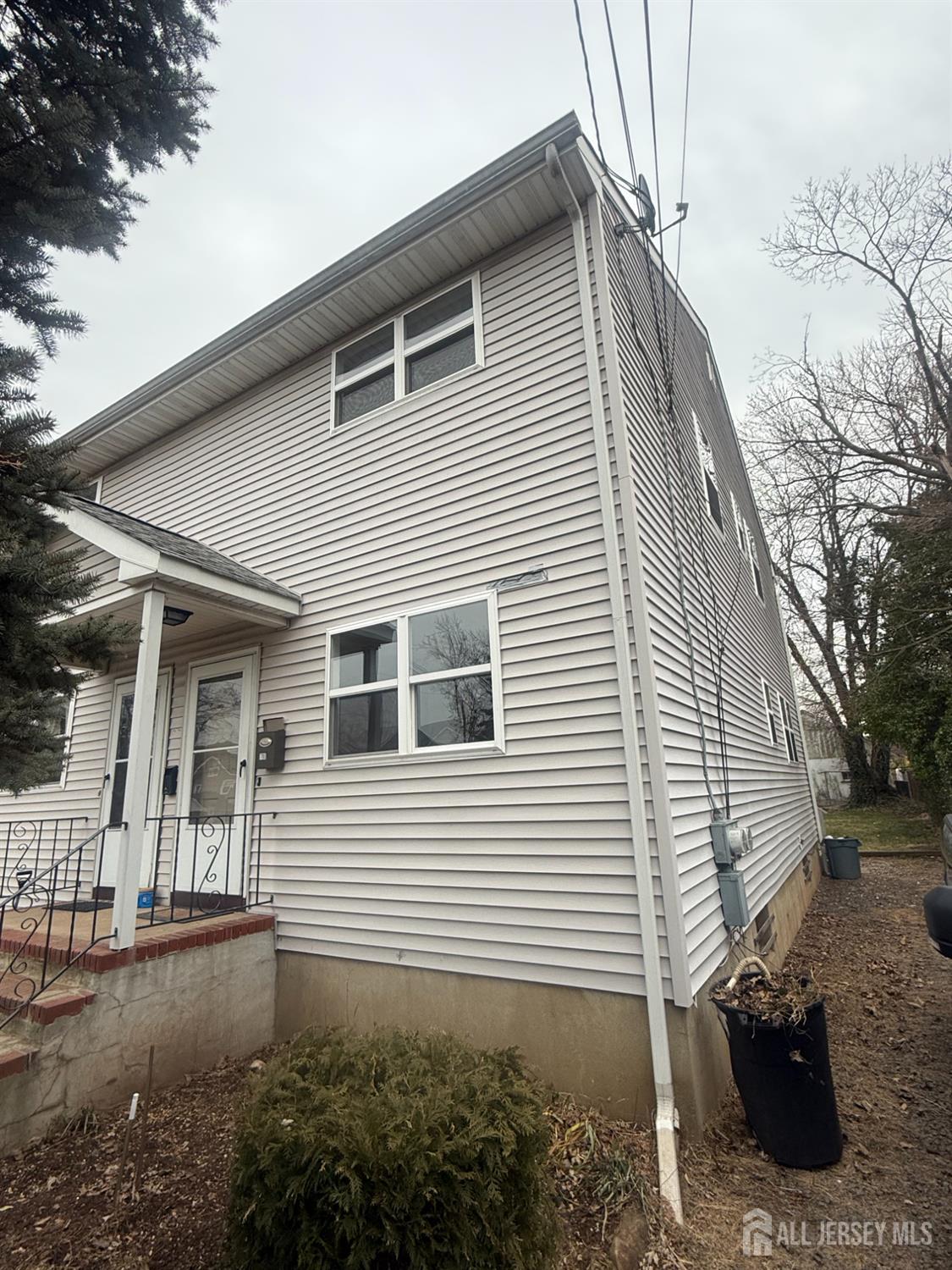 710-712 Drake Avenue, Unit 710 Middlesex, NJ 08846 - Photo 19 of 25 a view of a house with a yard