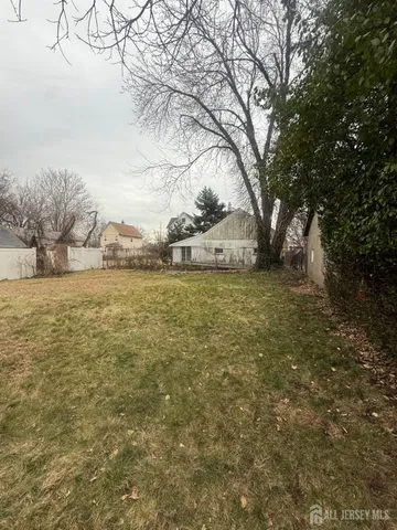 a view of a yard with an outdoor space