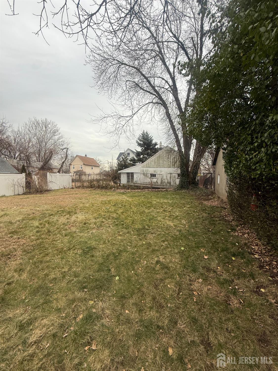 710-712 Drake Avenue, Unit 710 Middlesex, NJ 08846 - Photo 21 of 25 a view of a yard with an outdoor space
