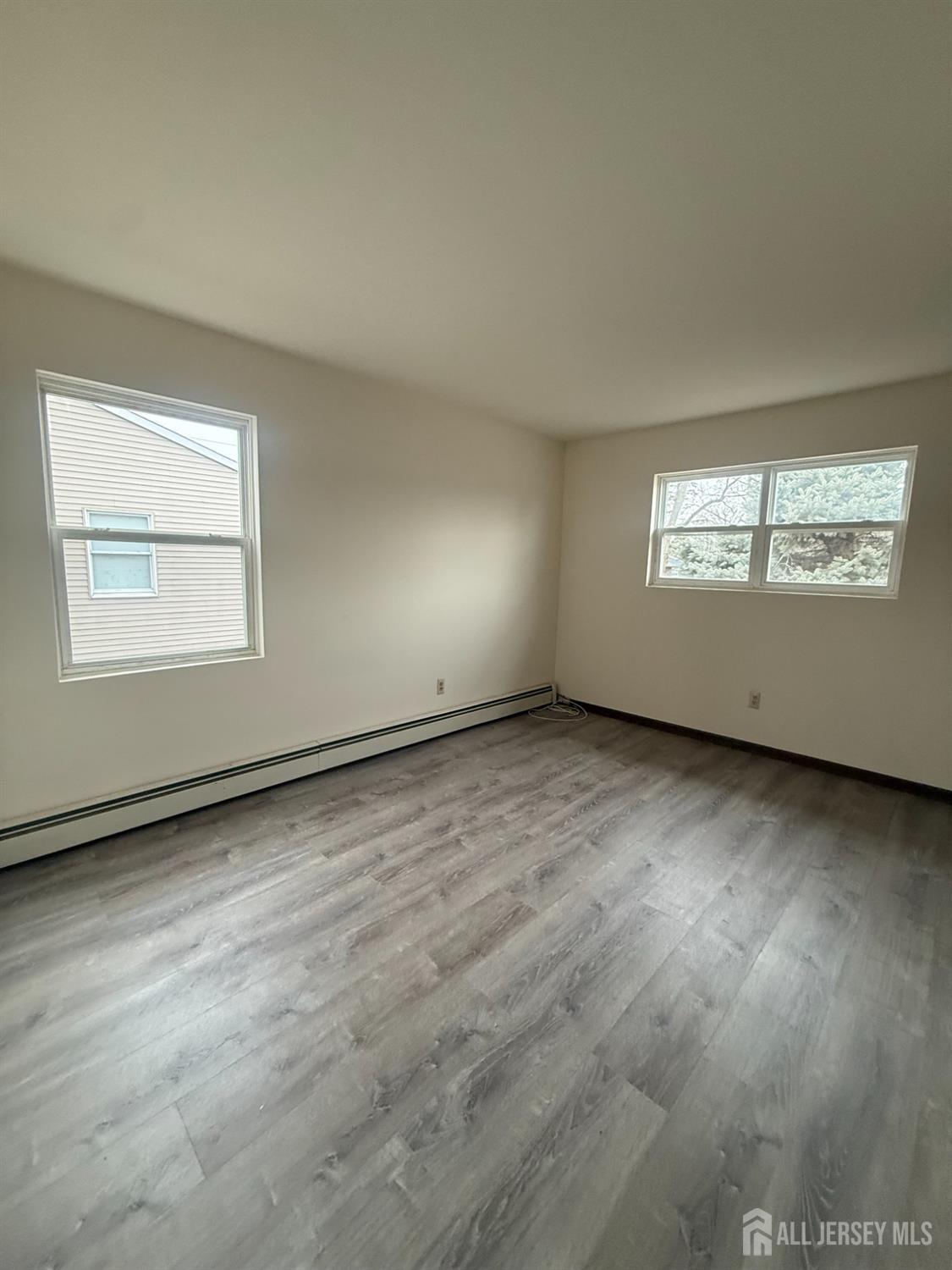 710-712 Drake Avenue, Unit 710 Middlesex, NJ 08846 - Photo 10 of 25 an empty room with a window