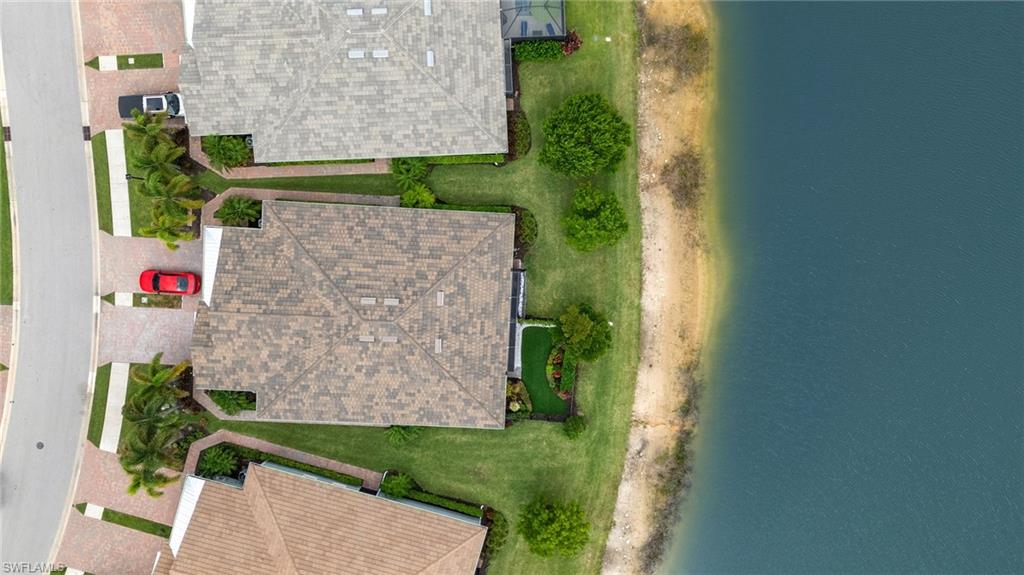 14615 Edgewater Circle Naples, FL 34114 - Photo 27 of 42 an aerial view of a house with a yard