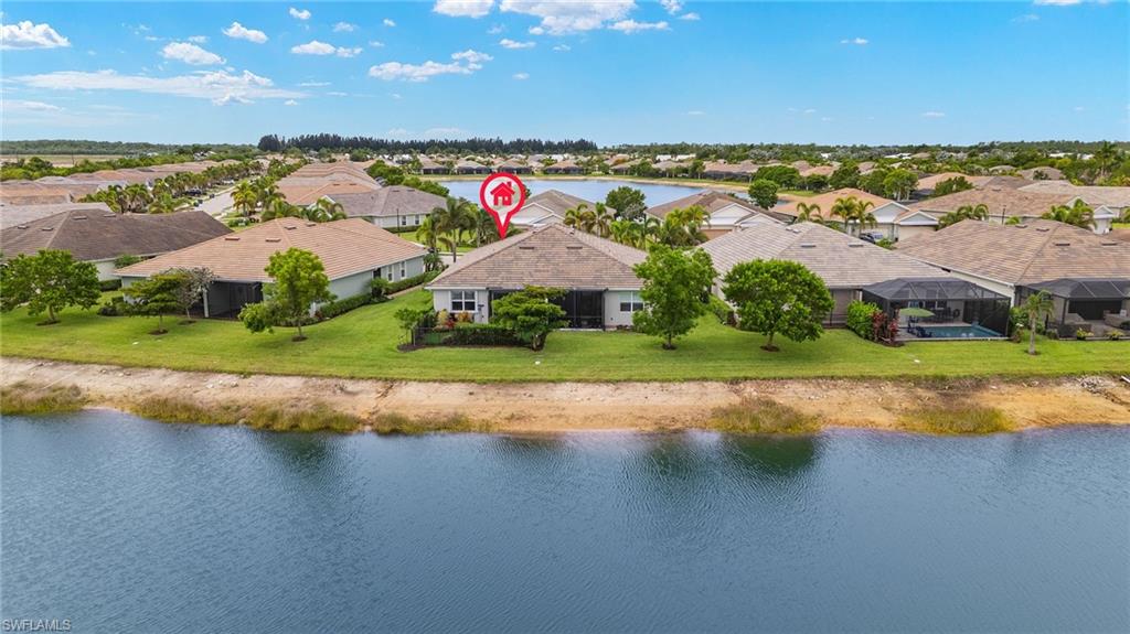 14615 Edgewater Circle Naples, FL 34114 - Photo 29 of 42 an aerial view of residential houses with outdoor space and river