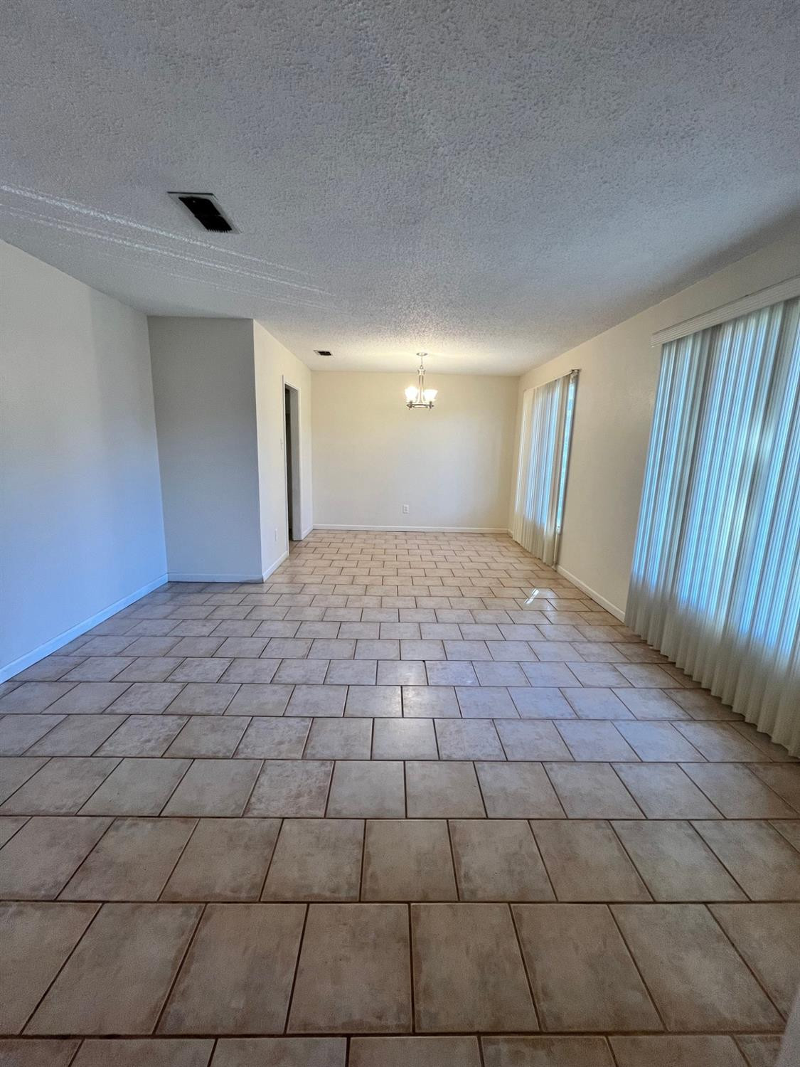 6305 Raleigh Avenue Lubbock, TX 79414 - Photo 4 of 19 a bathroom with a sink and a mirror